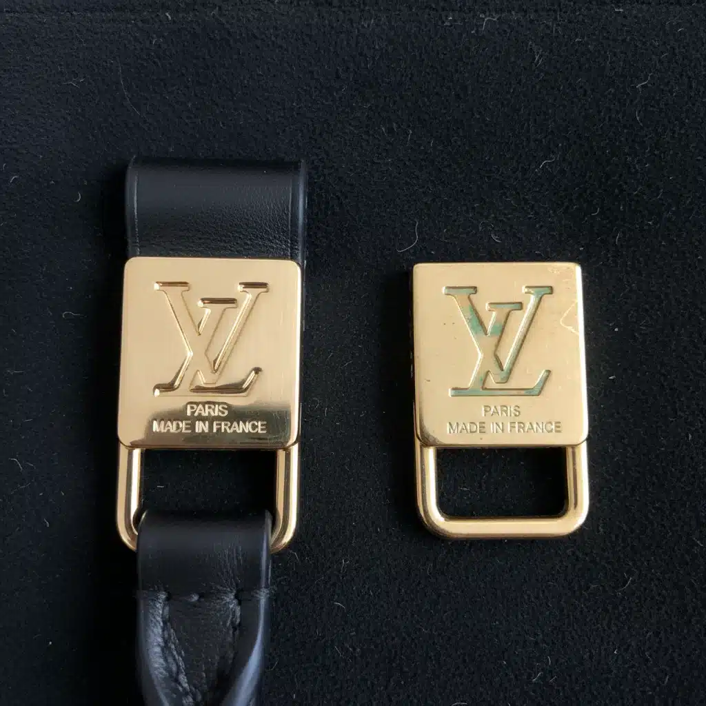 Close-up of authentic vs fake luxury hardware engraving